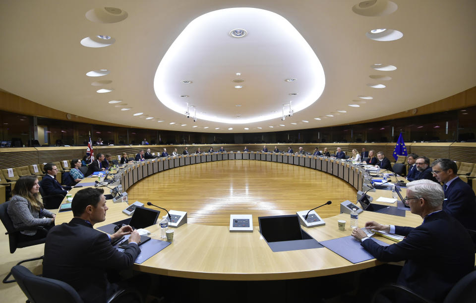 European Union's Brexit negotiator Michel Barnier and British Brexit negotiator David Frost attend a meeting with their delegations on further Brexit negotiations at EU headquarters in Brussels, Monday, June 29, 2020. European Union and U.K. negotiators resumed in-person talks on a post-Brexit trade deal on Monday, with both sides insisting that the process must accelerate markedly if they're to reach an agreement by the end of the year. (John Thys, Pool Photo via AP)