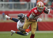 <p>San Francisco 49ers tight end George Kittle (85) runs with the ball away from Denver Broncos strong safety Will Parks (34) during the first half of an NFL football game Sunday, Dec. 9, 2018, in Santa Clara, Calif. (AP Photo/John Hefti) </p>