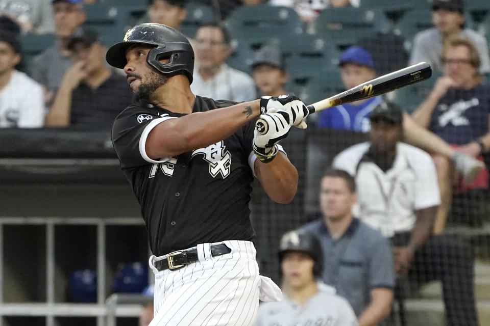 Chicago White Sox's Jose Abreu watches his home run off Kansas City Royals starting pitcher Daniel Lynch during the first inning of a baseball game Thursday, Aug. 5, 2021, in Chicago. (AP Photo/Charles Rex Arbogast)