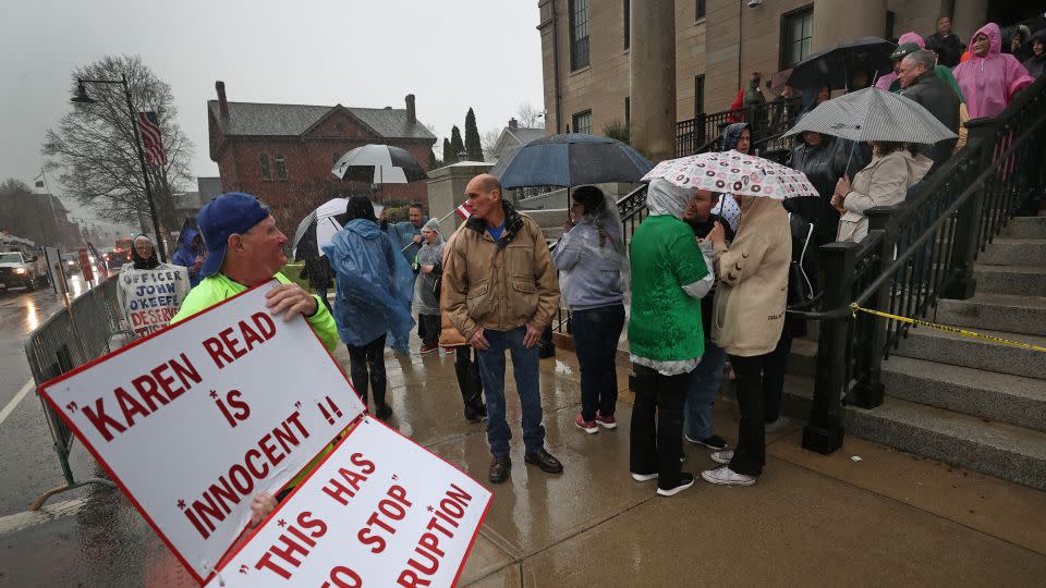 Protesters gather outside the courthouse during a recent pretrial hearing for Karen Read at Norfolk County Superior Court in Dedham, Massachusetts. - David L. Ryan/The Boston Globe/Getty Images