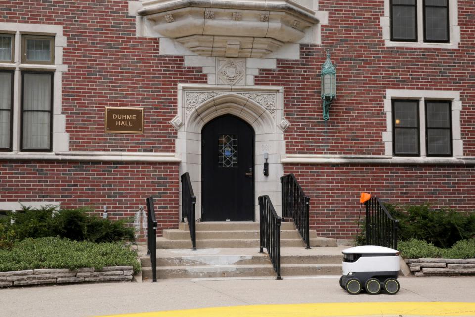 A Starship Technologies robot drives past Duhme Hall on First st., Thursday, Aug. 8, 2019 in West Lafayette. The self-driving delivery robot is mapping the Purdue campus according to an employee.