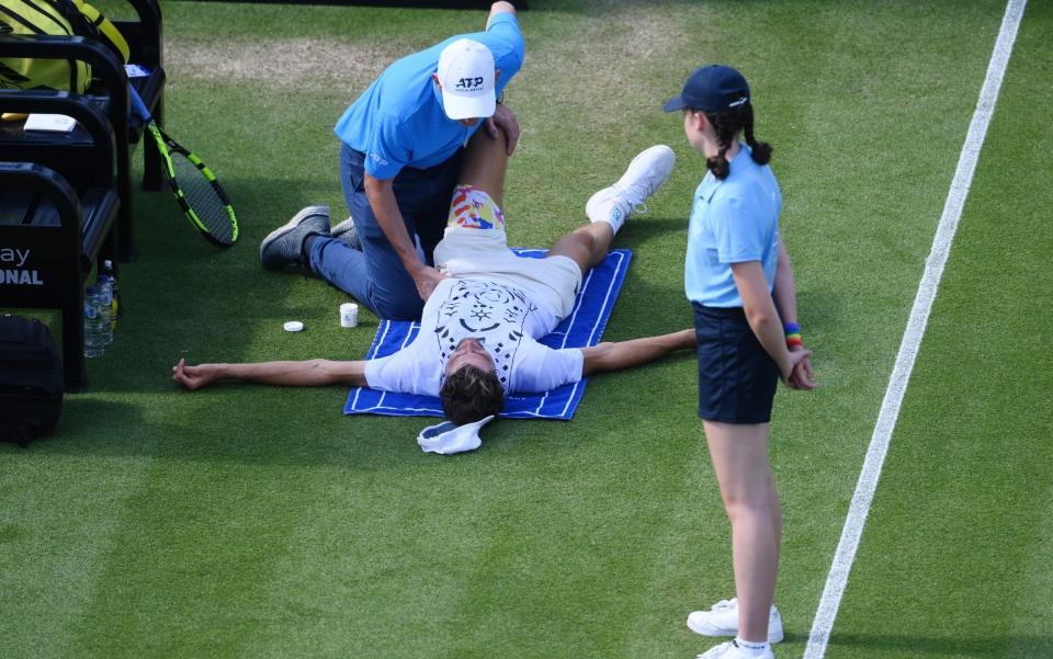 Maxime Cressy receives medical attention during his match against Jack Draper - Mike Hewitt/Getty Images Europe