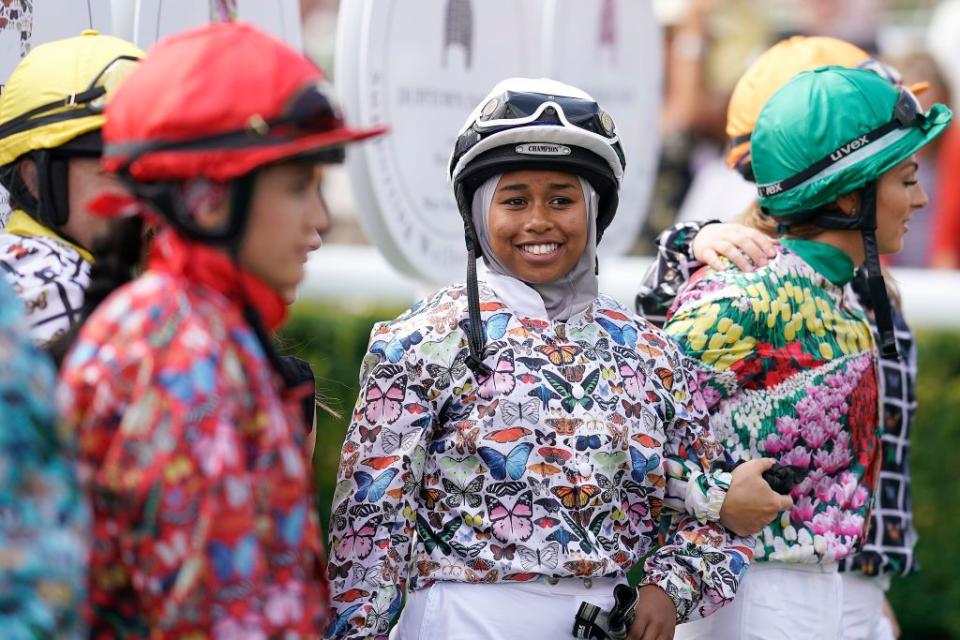 <p>The first hijab-wearing jockey to compete in a British horse race, Mellah won the Magnolia Cup in August, 2019. Beating 25:1 odds to win on her mount Haverland, she rode to victory at the same time as studying for her A-Levels. In November 2019 Mellah won the Times Young Sportswoman of the Year award. Originally from Peckham the then 19-year old was introduced to riding after her mother saw a advertising leaflet in their local mosque. </p>