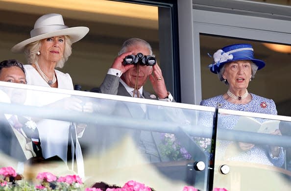 <div class="inline-image__caption"><p>Camilla, Duchess of Cornwall, Prince Charles, Prince of Wales (using binoculars) and Lady Susan Hussey (Lady-in-waiting to Queen Elizabeth II) watch the racing as they attend day 2 of Royal Ascot at Ascot Racecourse on June 15, 2022 in Ascot, England.</p></div> <div class="inline-image__credit">Max Mumby/Indigo/Getty Images</div>