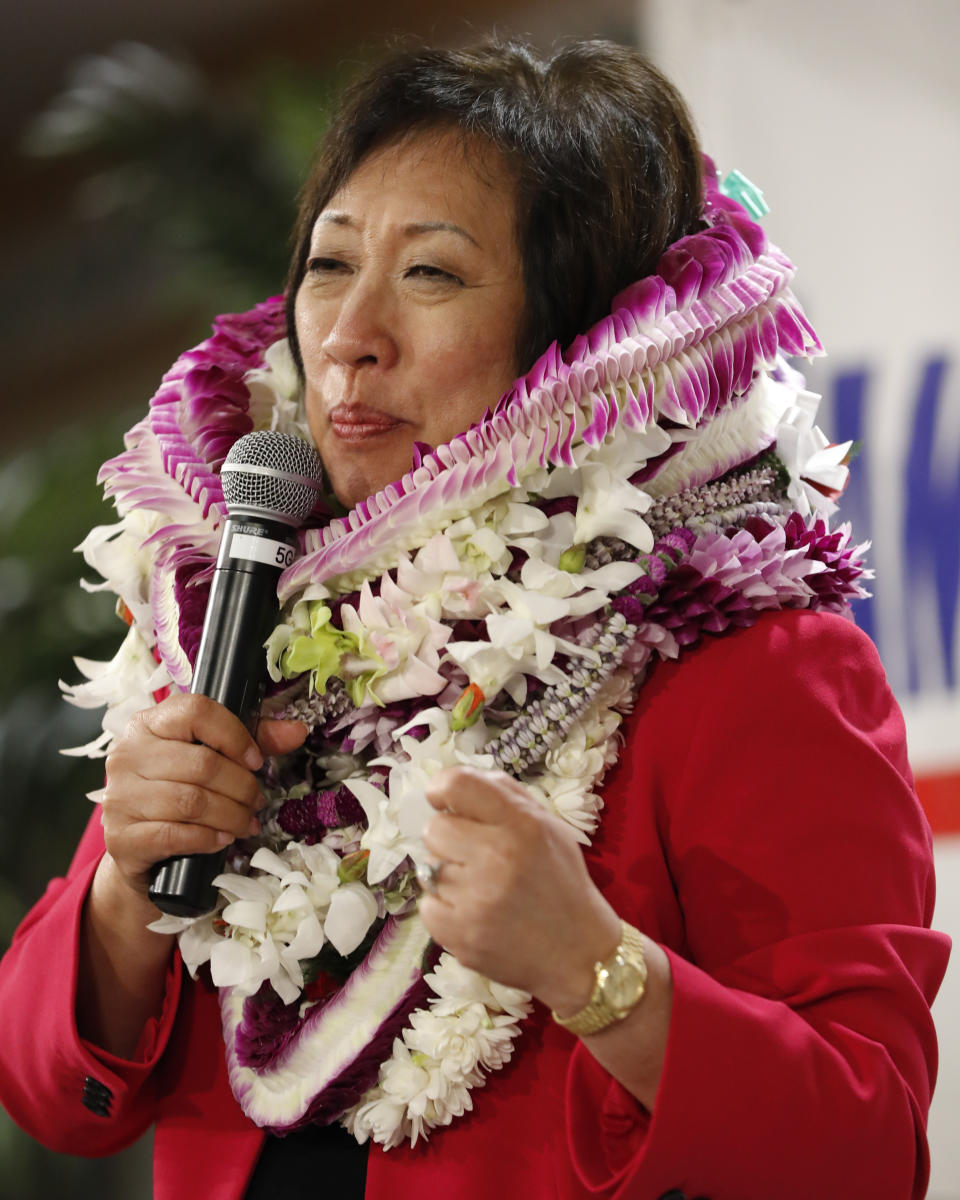 U.S. Rep Colleen Hanabusa speaks to supporter at her campaign headquarters, Saturday, Aug. 11, 2018, in Honolulu. (AP Photo/Marco Garcia)