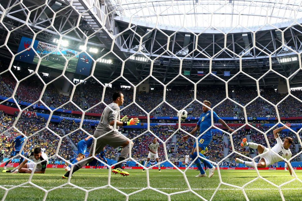 Neymar and Navas get ready to pounce on a loose ball in the box