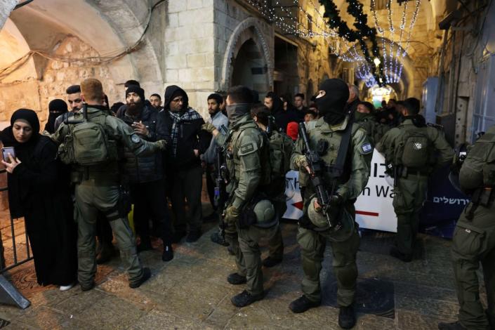 <div class="inline-image__caption"><p>Israeli security forces are seen during the expulsion of worshipers from Al-Aqsa mosque compound in Jerusalem's Old City following clashes with Palestinians in Al-Aqsa Mosque on April 5, 2023. Clashes erupted inside the Al-Aqsa mosque in Jerusalem early April 5, 2023 as Israeli police said they had entered to dislodge "agitators", a move denounced as an "unprecedented crime" by the Palestinian Islamist movement Hamas.</p></div> <div class="inline-image__credit">Ahmad Gharabi/AFP via Getty Images</div>