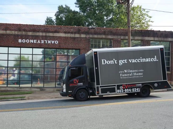 The ad truck drove around Charlotte on Sunday as football fans headed to a game (BooneOakley)