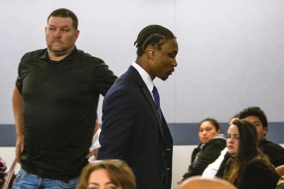 Former Las Vegas Raiders player Henry Ruggs leaves court on Tuesday, May 2, 2023, in Las Vegas. Ruggs told a judge Tuesday he will admit that he drove drunk at speeds up to 156 mph, causing a fiery crash that killed a woman. The plea deal could send the 24-year-old first-round NFL draft pick to state prison for three to 10 years. (AP Photo/Ty O'Neil)