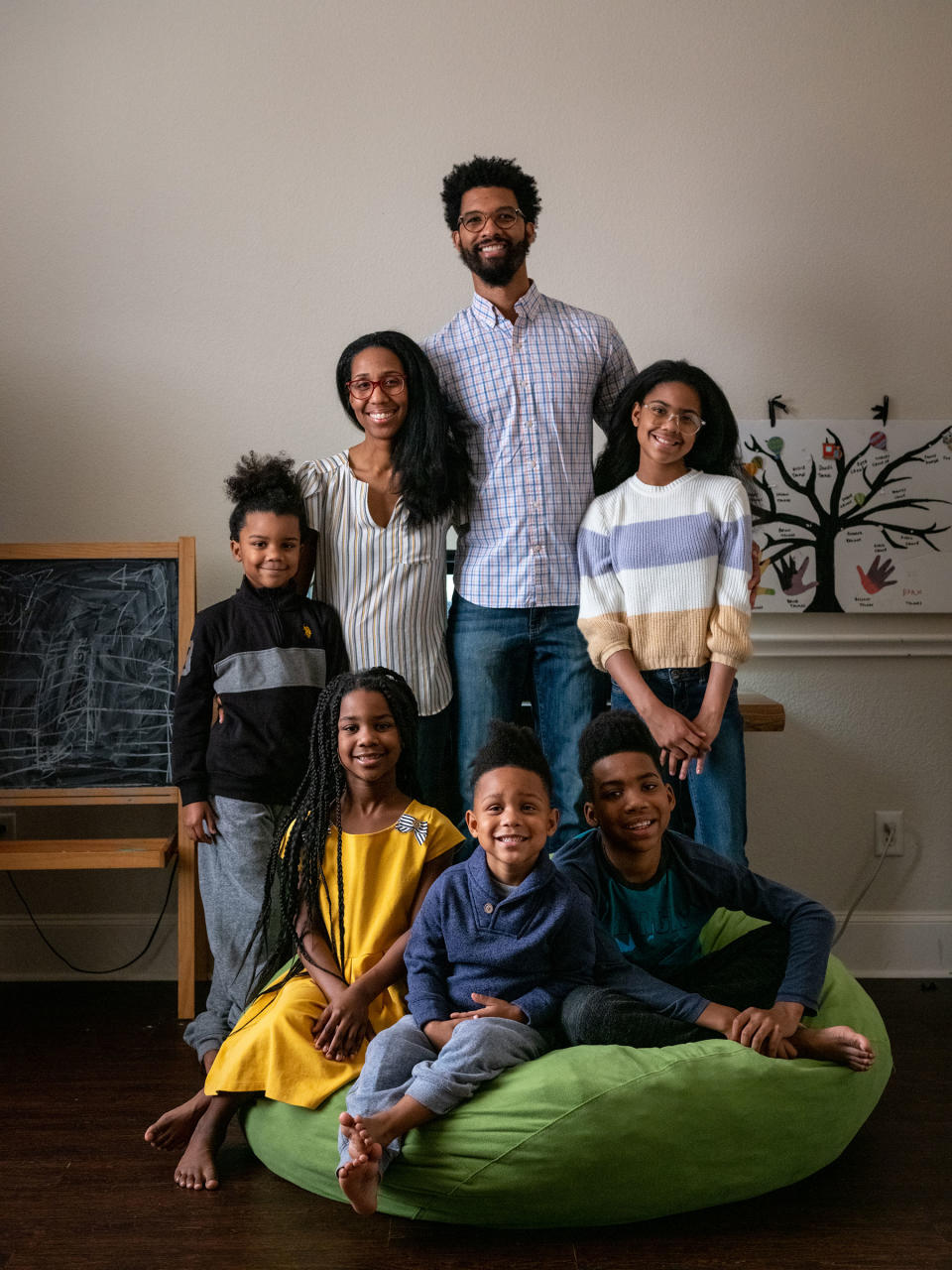 The Thomas family poses for a portrait in their home in Richardson.<span class="copyright">Ilana Panich-Linsman for TIME</span>