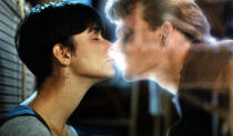 <b>Ghost (1990)</b><br> <b>Scene:</b> Forget the spinny pottery love scene, later on in the film, Molly (Demi Moore) kisses the ghost of her dead husband Sam, played by the late Patrick Swayze. <br> <b>Offense:</b> No actual lip action