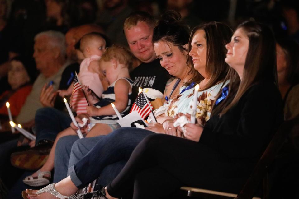 Family members attend a vigil to honor the life and service of Marine Staff Sgt. Taylor Hoover at the Capitol in Salt Lake City on Sunday, Aug. 29, 2021. Hoover was one of the 13 U.S. service members killed by the terrorist attack at Hamid Karzai International Airport in Kabul, Afghanistan. | Shafkat Anowar, Deseret News