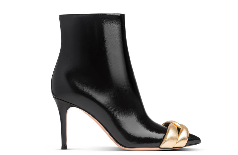 A gold “love knot” on Gianvito Rossi’s fall ankle boot.