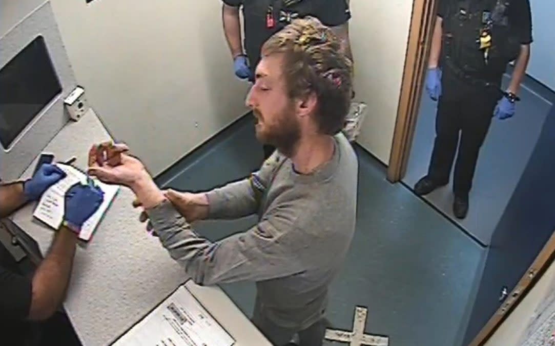 A CCTV still of Lewis-Ranwell being released from Barnstaple Police Station hours before killing three men