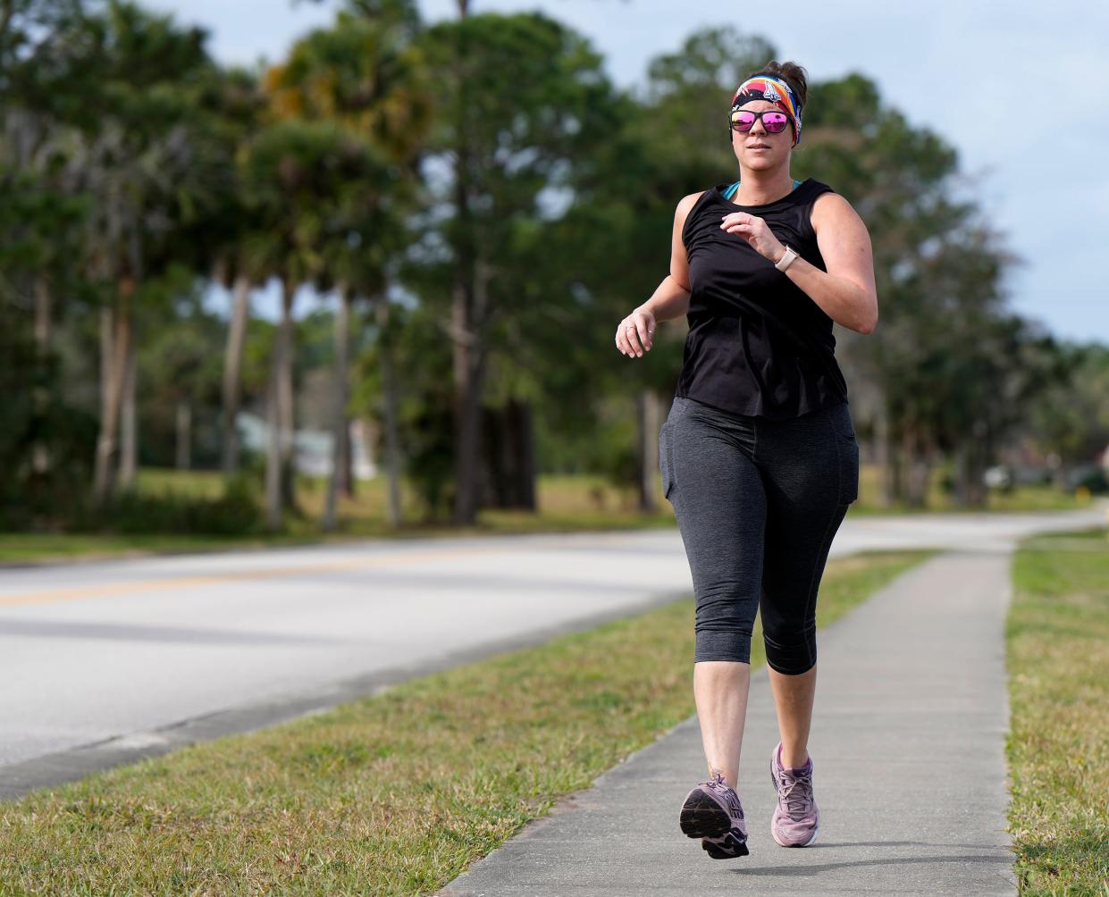 Sarah Callahan runs in Daytona Beach, Saturday, Feb. 10, 2024, in preparation for the upcoming New York City Half Marathon.