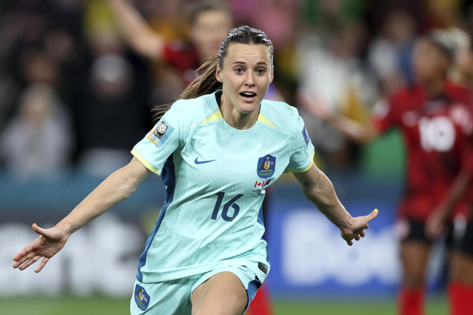 Australia's Hayley Raso celebrates after scoring her side's second goal during the Women's World Cup Group B soccer match between Australia and Canada in Melbourne, Australia, Monday, July 31, 2023. (AP Photo/Victoria Adkins)