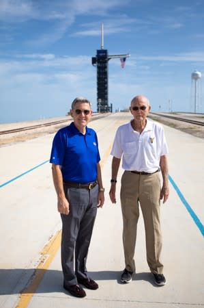 Astronaut Michael Collins speaks with NASA's John F. Kennedy Space Center Director Bob Cabana at Launch Pad 39A at the NASA's John F. Kennedy Space Center on the 50th anniversary of the launch of the Apollo 11 mission to the moon, in Cape Canaveral