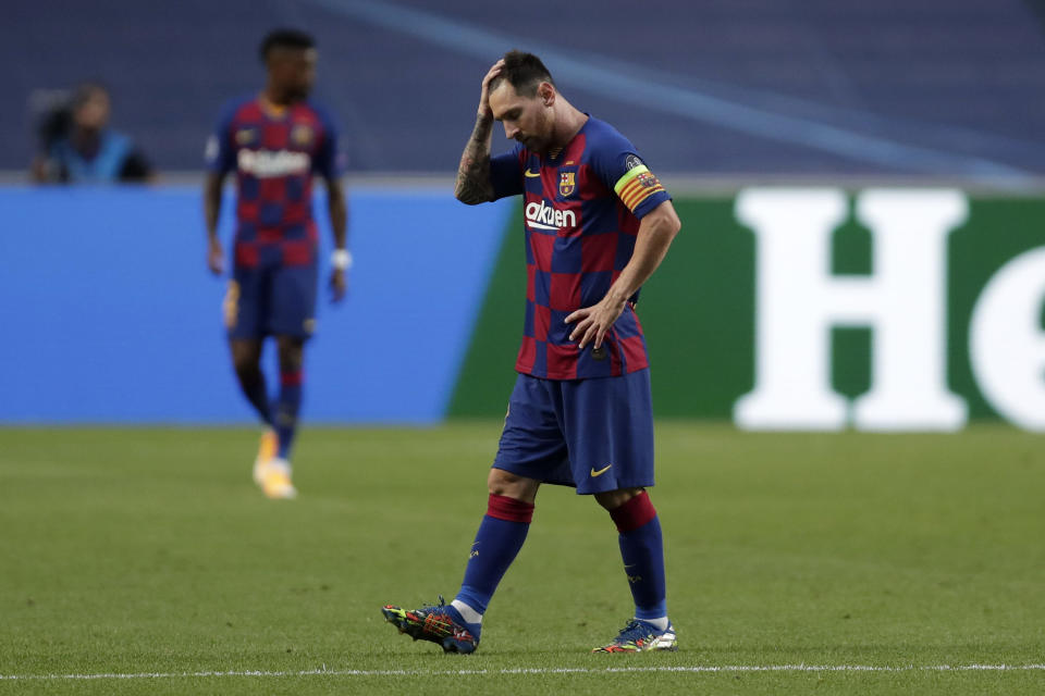 LISBON, PORTUGAL - AUGUST 14: Lionel Messi of FC Barcelona looks dejected after his team concede during the UEFA Champions League Quarter Final match between Barcelona and Bayern Munich at Estadio do Sport Lisboa e Benfica on August 14, 2020 in Lisbon, Portugal. (Photo by Manu Fernandez/Pool via Getty Images)