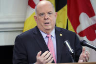 FILE - In this Thursday, Oct. 1, 2020, file photo, Maryland Gov. Larry Hogan speaks during a news conference in Annapolis, Md. On Tuesday, March 9, 2021, Hogan announced that some restrictions on businesses will be lifted later in the week. For example, on Friday at 5 p.m., limits will be lifted on outdoor and indoor dining at restaurants and bars, but people will still need to be seated and distanced. (AP Photo/Brian Witte, File)