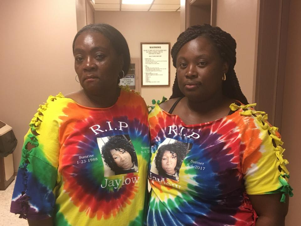 Maryann Jones (left) and Amy McGlory wear tie-dye T-shirts in memory of Jaylow McGlory.