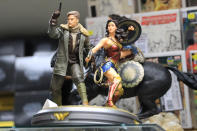 <p>Statues of Wonder Woman and Steve Trevor at the Midtown Comics in New York City. (Gordon Donovan/Yahoo News) </p>