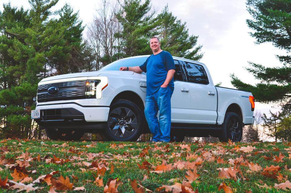 Joe Sholtes, a public safety dispatcher from Albany, New York, is seen here with his Ford F-150 Lightning in Saratoga, New York, in October 2022. He flew to Norway for an April 20, 2023, Ford news conference to announce the Lightning will be sold in Norway in 2024.