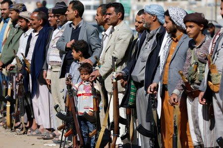 Boys take part in a gathering held by armed Houthi followers to show support for the Houthi movement in Sanaa, Yemen December 19, 2018. REUTERS/Khaled Abdullah