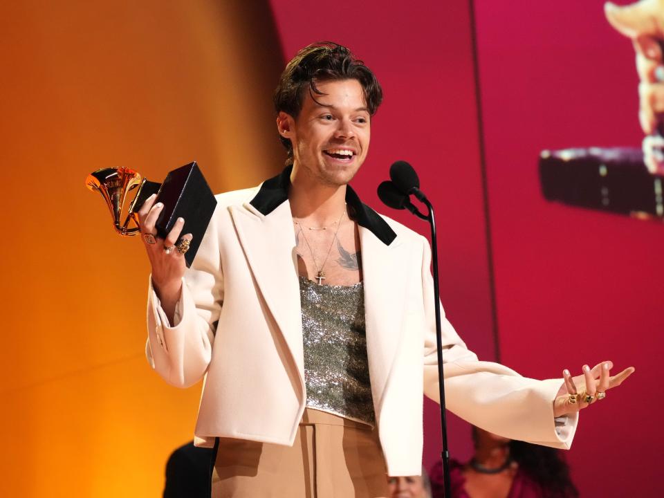 Styles accepting his AOTY Award.