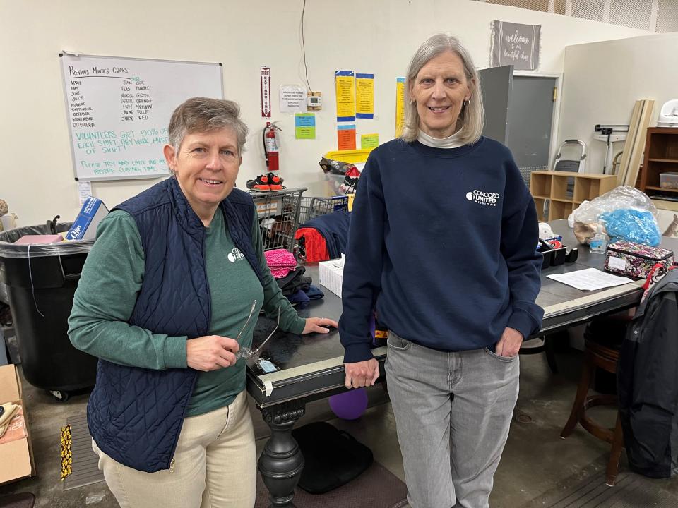 Concord United Methodist Church missions director Jane Currin, left, and church member and store volunteer Lisa Stinton are shown inside The Thrift Store on April 27, 2023.