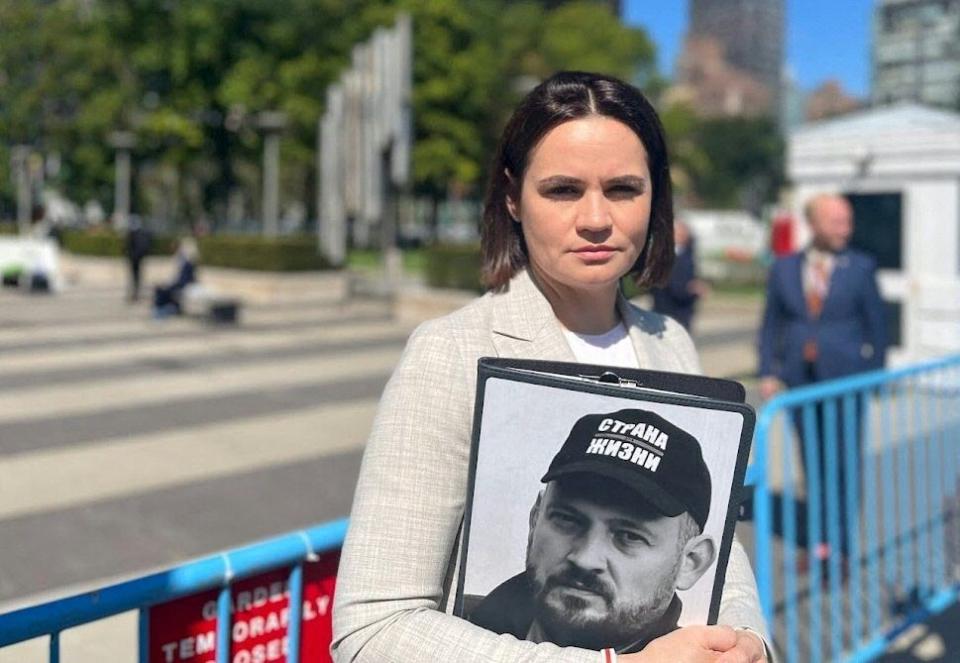 Belarusian opposition leader Svetlana Tsikhanouskaya holds a photo of her jailed husband, Siarhei Tsikhanouski, as she stands for a photo outside of United Nations headquarters in New York City on Sept. 19, 2023. (MARIA DANILOVA/AFP via Getty Images)