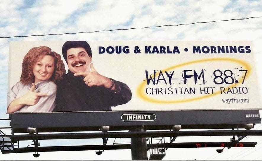 A late 1990s billboard for Christian station WAY-FM morning team Doug Griffin and Karla Lawson Henry
