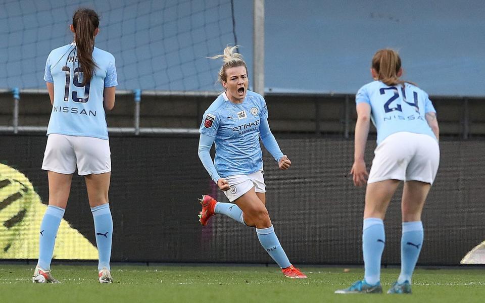 Manchester City's Lauren Hemp (centre) celebrates scoring her teams second goal against Chelsea - PA