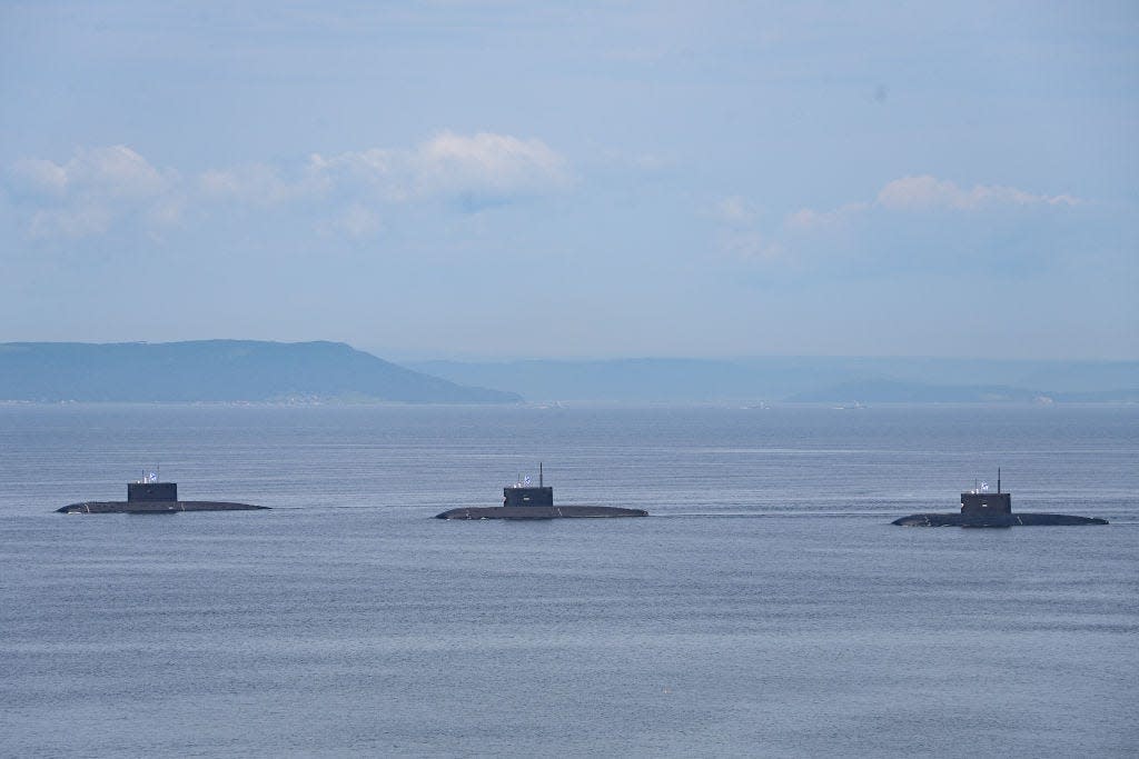 Three Russian submarines are spotted in the ocean during training exercises near Vladivostok in Russia.