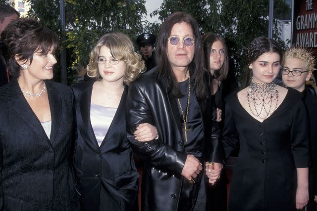 <p>Ron Galella, Ltd./Ron Galella Collection via Getty</p> Ozzy Osbourne with his family at the 2000 Grammys