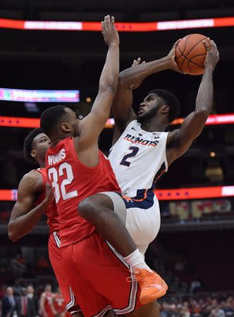 Dec 5, 2018; Chicago, IL, USA; Illinois Fighting Illini forward Kipper Nichols (2) is called for the charge against Ohio State Buckeyes guard Keyshawn Woods (32) at United Center. Quinn Harris-USA TODAY Sports