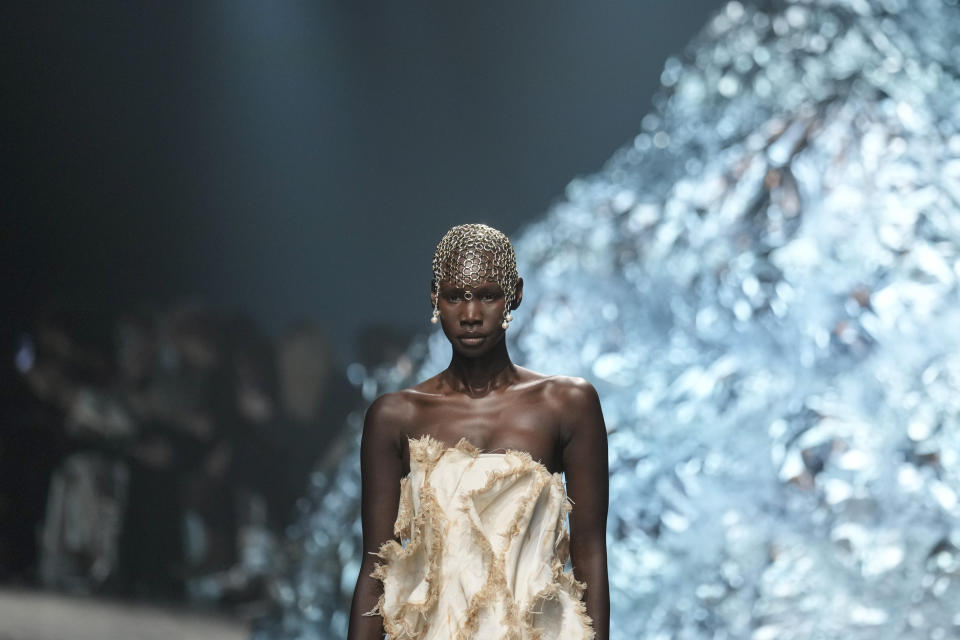 A model wears a creation as part of the Annakiki women's Fall-Winter 2023-24 collection presented in Milan, Italy, Sunday, Feb. 26, 2023. (AP Photo/Antonio Calanni)