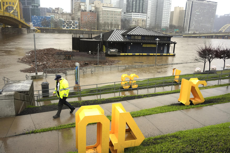 The Northshore riverwalk outside PNC Park in Pittsburgh is flooded by the overflowing Allegheny River Wednesday, April 3, 2024. (AP Photo/Gene J. Puskar)