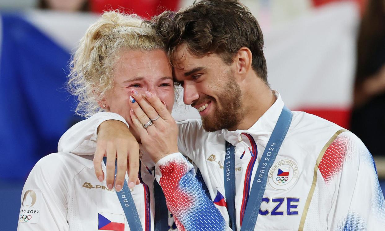 <span>Kateřina Siniaková and Tomáš Macháč broke up before the Games but their mixed doubles tennis win prompted one reader to wonder if they had got back together.</span><span>Photograph: Xinhua/Rex/Shutterstock</span>