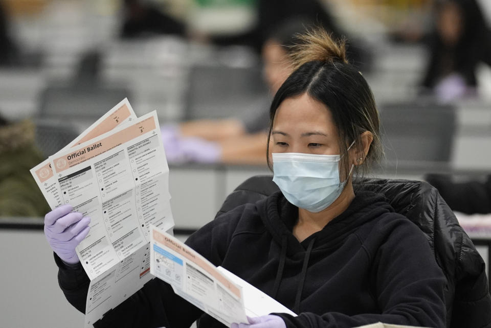 Ballots are inspected at a ballot processing center Tuesday, March 5, 2024, in the City of Industry, Calif. (AP Photo/Marcio Jose Sanchez)