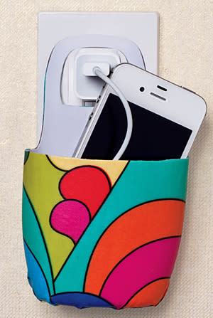 Plastic bottle cell phone holder photo by Lori Eanes