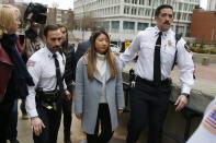 Inyoung You arrives at Suffolk Superior Court in Boston, Friday, Nov. 22, 2019. Prosecutors say You sent Alexander Urtula more than 47,000 text messages in the last two months of their relationship, including many urging him to "go kill yourself." (AP Photo/Michael Dwyer)