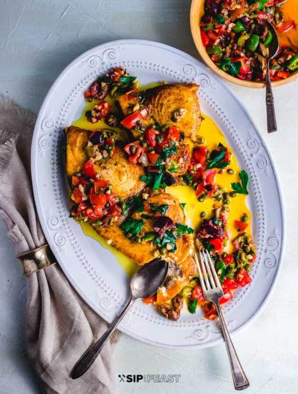 <p>Sip and Feast</p><p>Are you looking for an amazing fish recipe? If yes, then you need to try our pan seared swordfish with olives and capers!</p><p><strong>Get the recipe: <a href="https://www.sipandfeast.com/pan-seared-swordfish-olives-capers/" rel="nofollow noopener" target="_blank" data-ylk="slk:Pan Seared Swordfish with Olives and Capers;elm:context_link;itc:0;sec:content-canvas" class="link rapid-noclick-resp">Pan Seared Swordfish with Olives and Capers</a></strong></p>