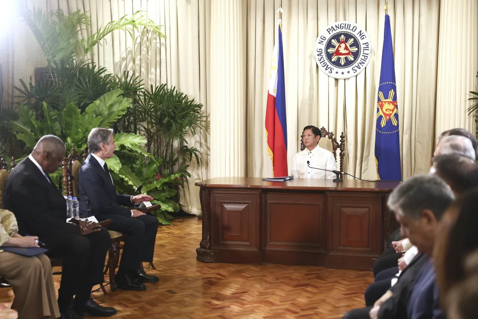 U.S. Secretary of State Antony Blinken, second from left, speaks to Philippine President Ferdinand Marcos Jr. as U.S. Secretary of Defense Lloyd Austin, left, listens at the Malacanang presidential palace in Manila, Philippines on Tuesday, July 30, 2024. (AP Photo/Basilio Sepe, Pool)