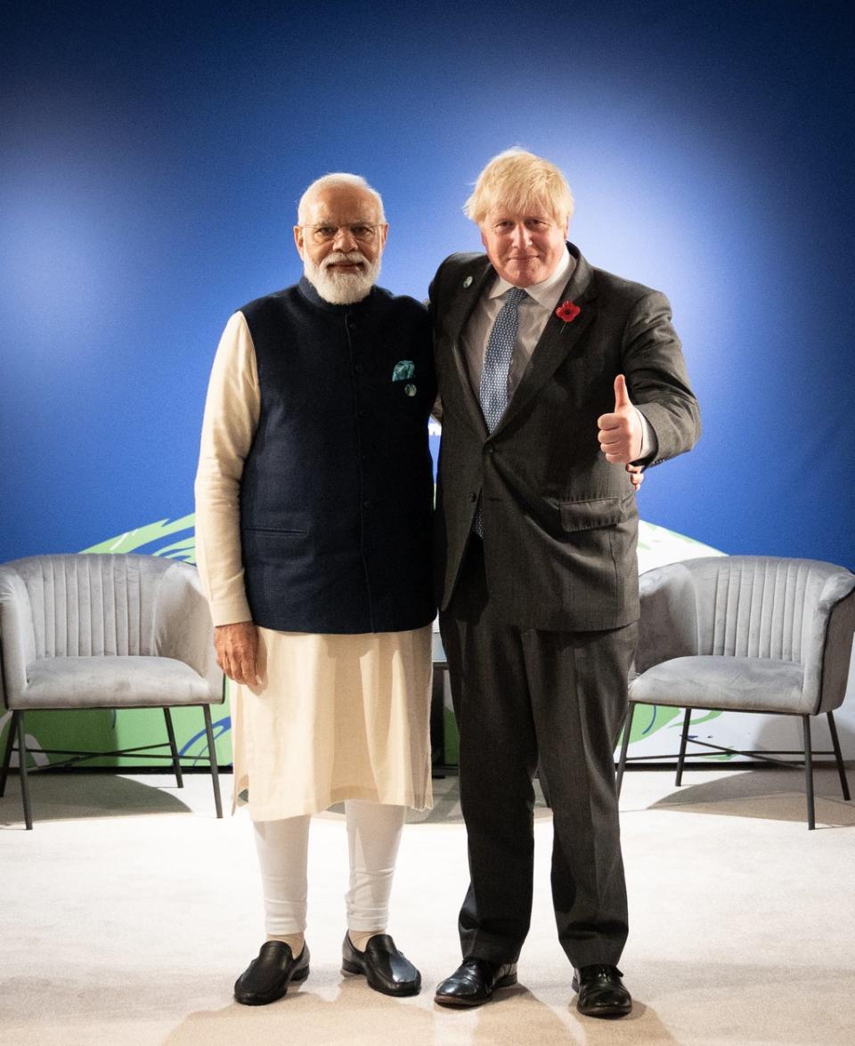 Boris Johnson greets India’s prime minister Narendra Modi at Cop26 (Stefan Rousseau/PA) (PA Wire)