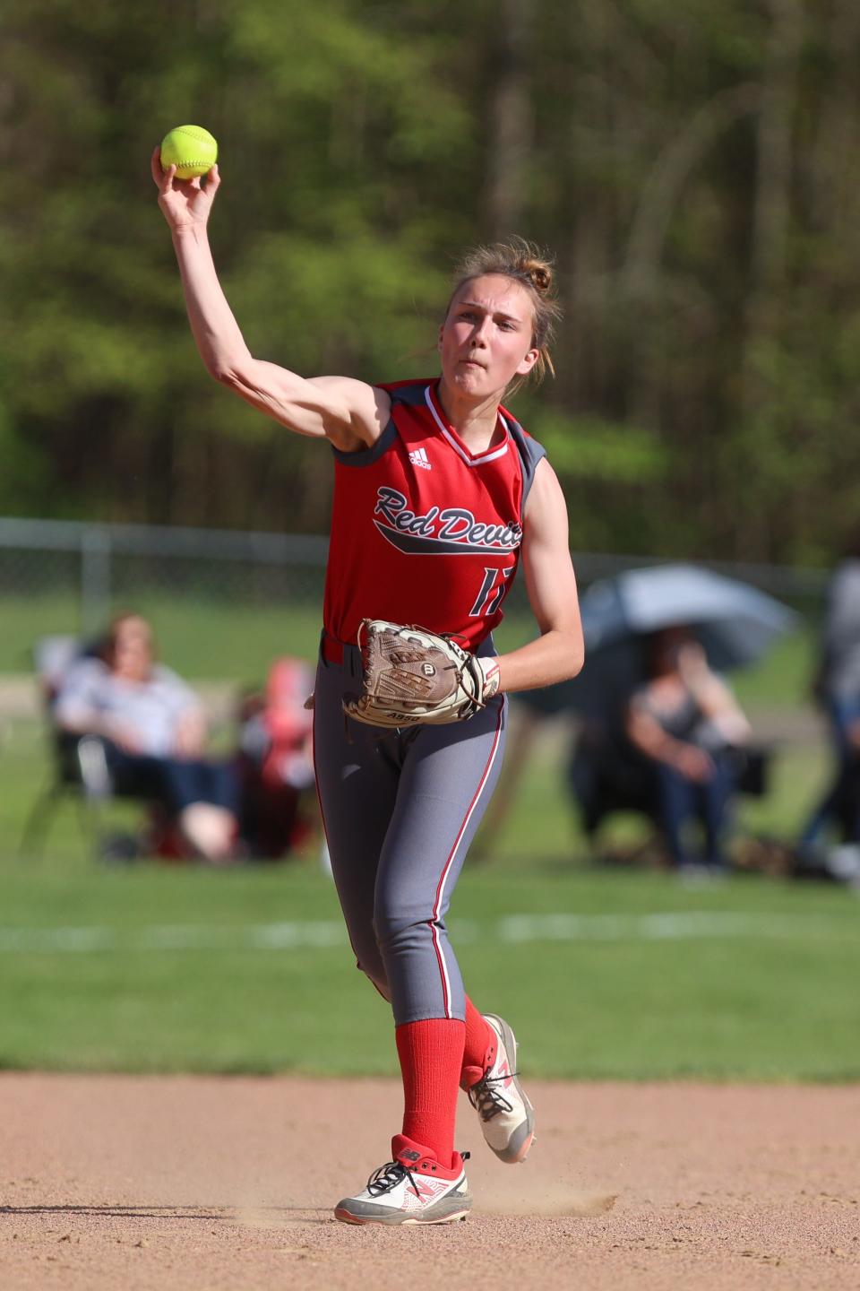 Crestwood junior shortstop Aimee Barnauskas makes a throw to first base during Tuesday’s first round playoff game against Gilmore Academy at Crestwood High School.