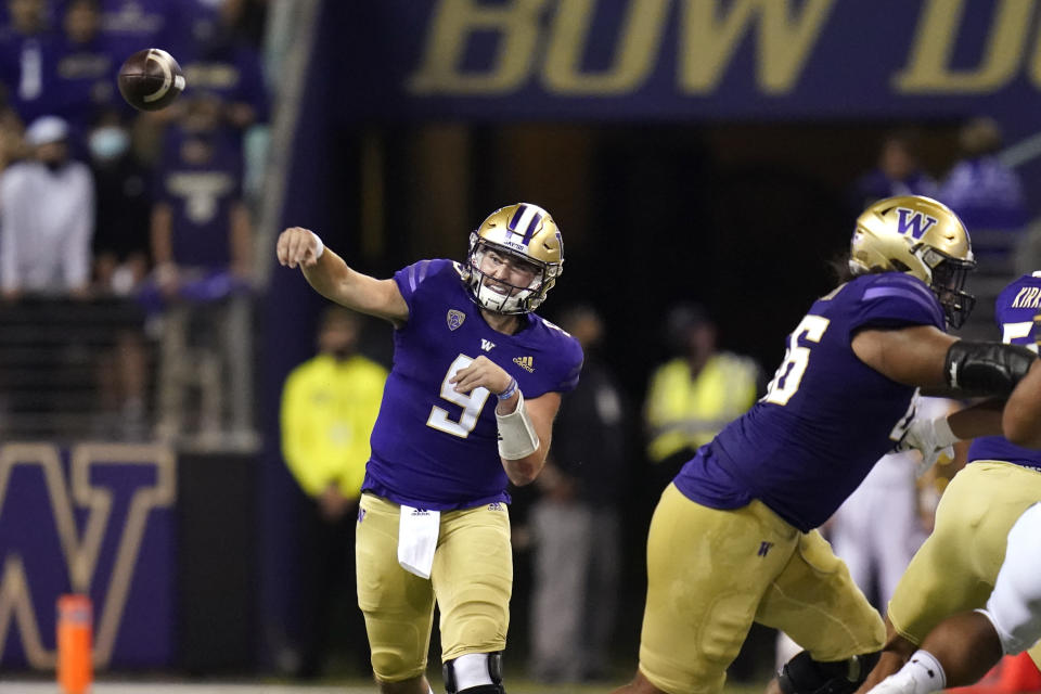 Washington quarterback Dylan Morris throws against California in the first half of an NCAA college football game Saturday, Sept. 25, 2021, in Seattle. (AP Photo/Elaine Thompson)