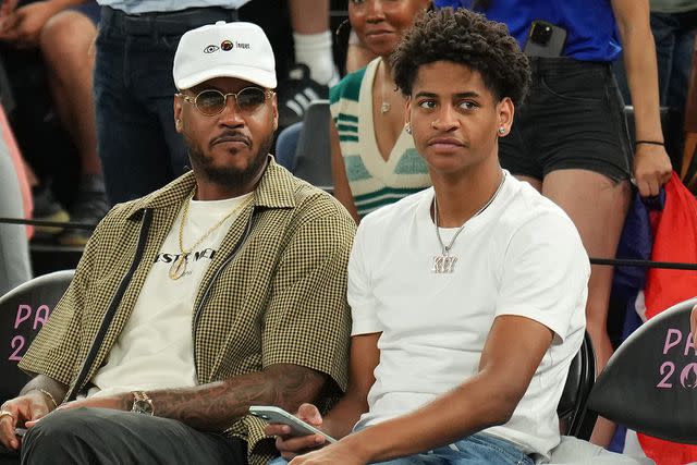 <p>Jesse D. Garrabrant/NBAE via Getty Images</p> Carmelo Anthony and Kiyan Anthony