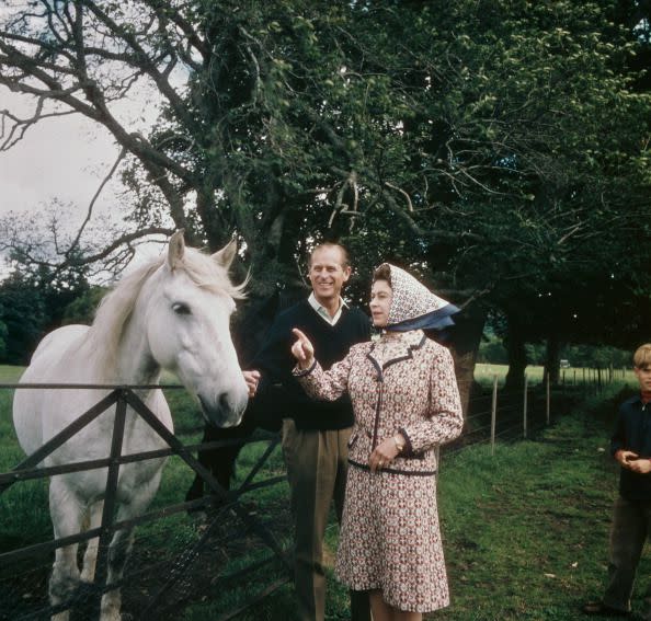 <p>Queen Elizabeth II and Prince Philip celebrate their silver wedding anniversary with a holiday on their Scottish estate, Balmoral, in 1972. </p>