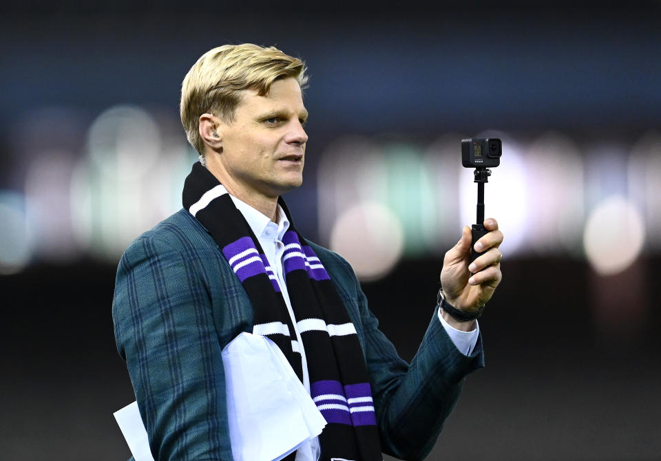 Nick Riewoldt (pictured) before commentary ahead of an AFL match.