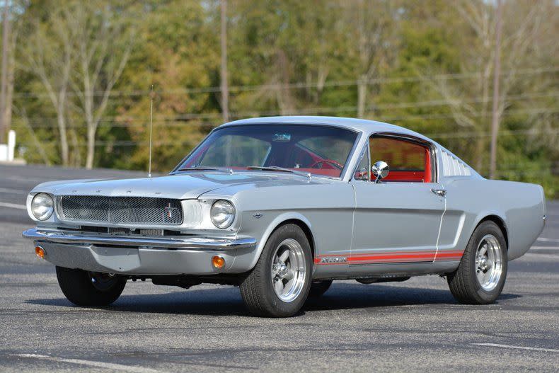 <img src="1965-ford-mustang.jpeg" alt="A completely restored 1965 Ford Mustang fastback">